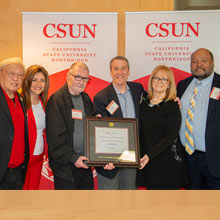 Dean, Director and others with award.