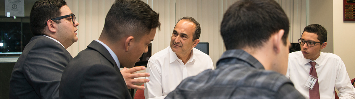 David Nazarian speaks to a group of students at a meeting