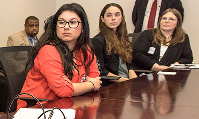 Female CSUN Students in a meeting.