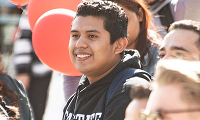 Smiling student at a celebration.