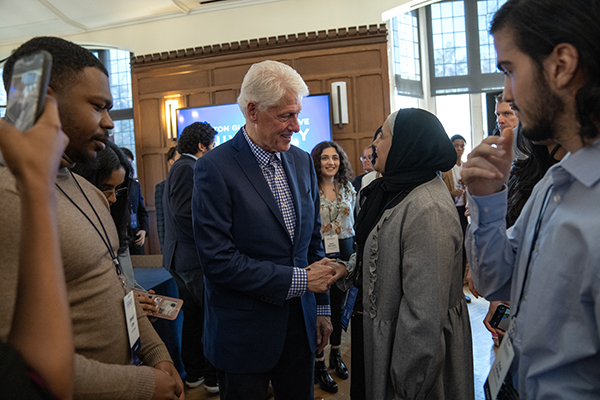 President Clinton shakes student's hand